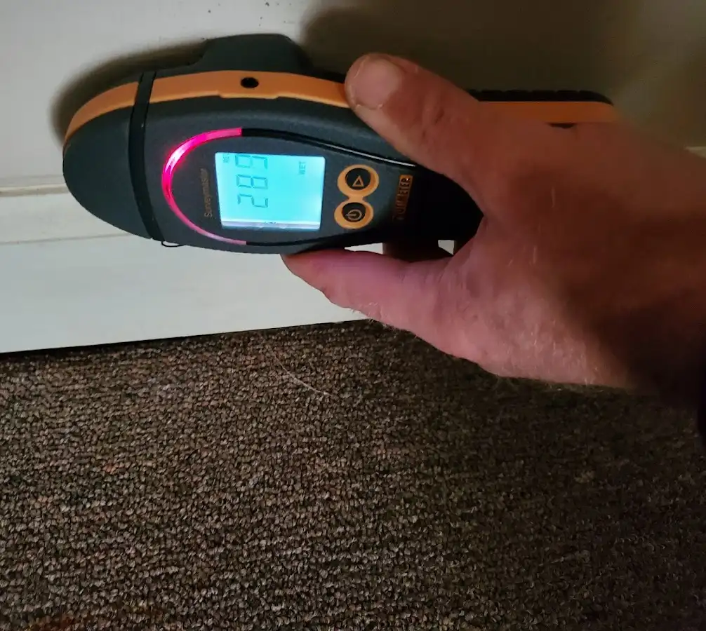 Moisture detection at baseboard during Sewage Cleanup & Sanitation in Clarcona